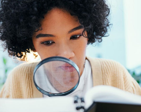 Adult reading and researching before joining a community